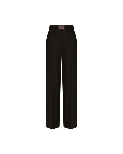 Dolce & Gabbana Black Flared Wool Pants With Logo Tag