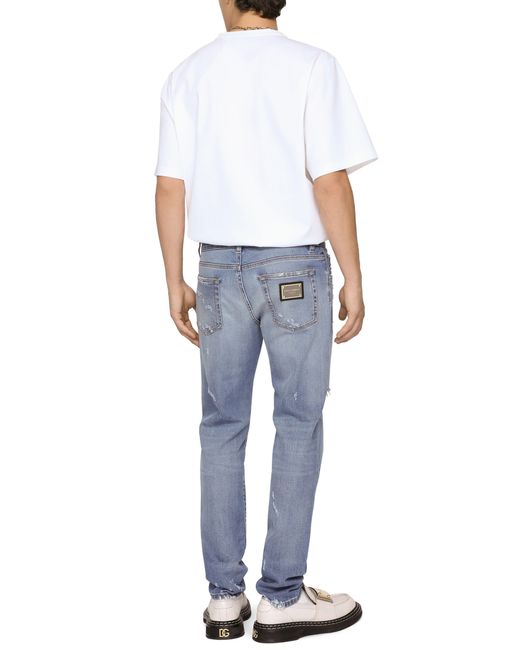 Dolce & Gabbana Stretch-Jeans Slim Fit mit Rissen in Blue für Herren