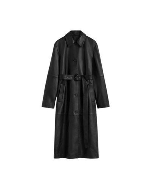Manteau En Cuir Ceinturé Totême  en coloris Black