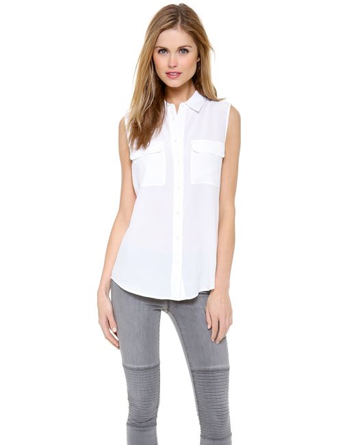 White equipment blouse From the signature silk blouse to the must-have shirtdress and pullovers, each piece in the Equipment collection reflects refined tailoring and attention to detail. Neiman Marcus offers a vast assortment of Equipment blouses, dresses, silk shirts, and more in a variety of styles and colors.
