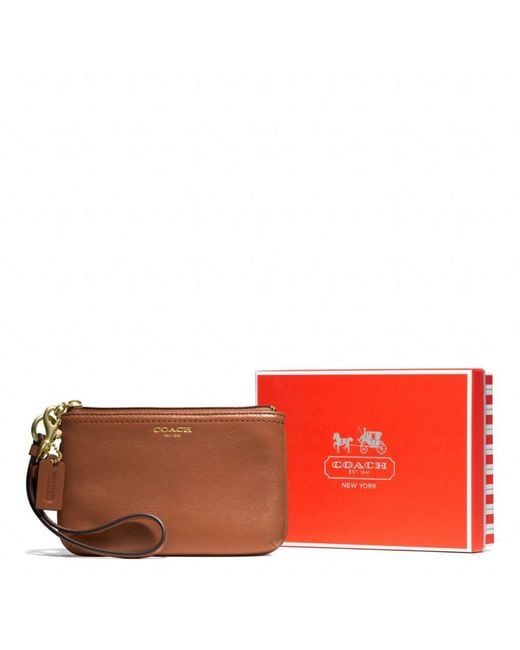 COACH Small Wristlet in Leather in Brown Lyst