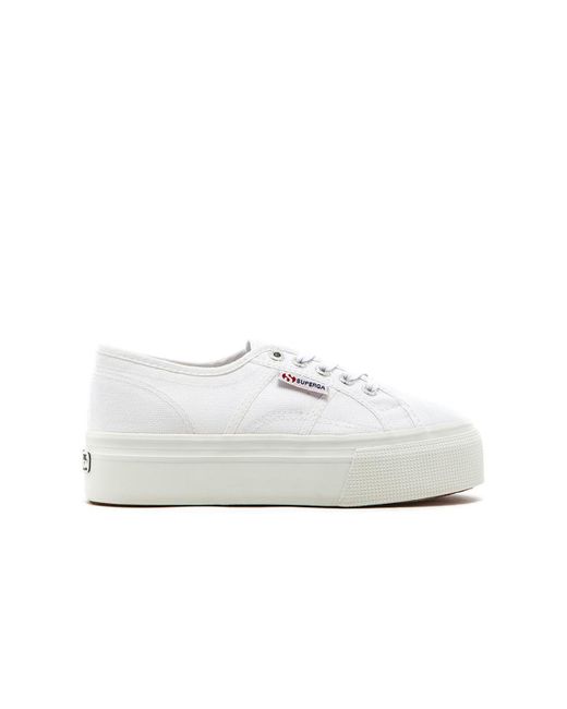 white lace up canvas sneakers