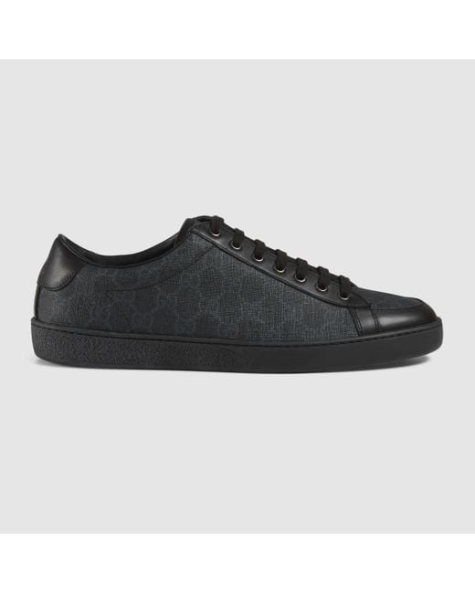 Black GG Supreme canvas and leather trainers