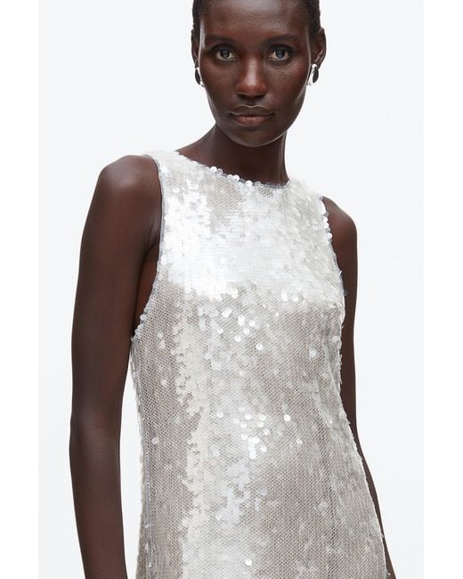 white sequin tank dress White Sequin Jacquard Backless Halter Neck Bodycon Dress, Women's Sexy V-Neck Mini Dress, NOVELA MINI, Suitable For Party Night, Tank Style, Music Festival, Wedding Season, Vacation #Back To School# Party Outfit #GirlsNightOut |