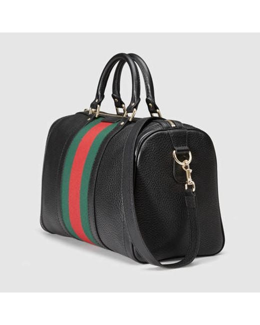 Lot - Gucci Black Leather Striped Boston Bag