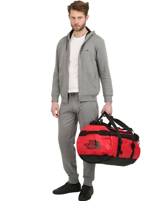 North face red sales duffle bag