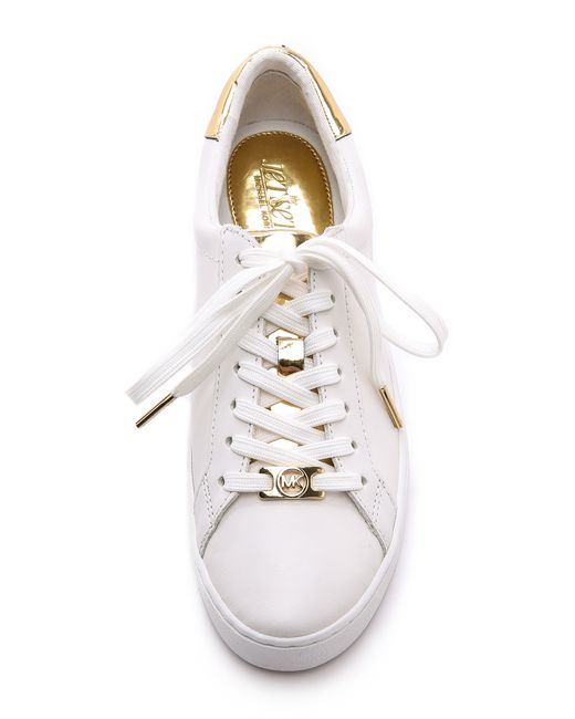 MICHAEL Michael Kors Lace Up Sneakers Gold in White | Lyst