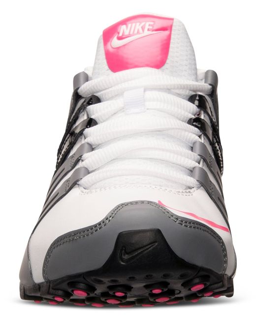 White and pink store nike shox