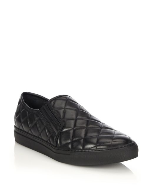 black leather quilted slip on sneakers