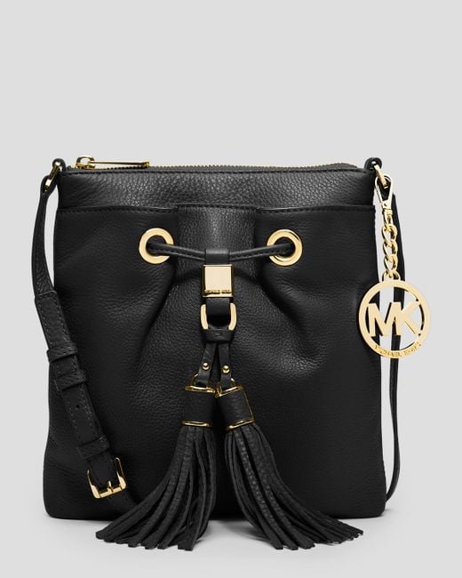 MICHAEL Michael Kors Drawstring Tassel Crossbody in Black | Lyst