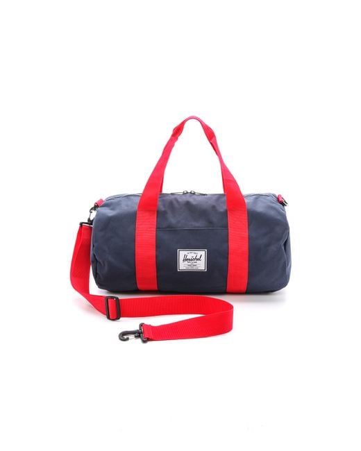 Herschel Supply Co. Blue Strand Duffle Bag - Navy/Red