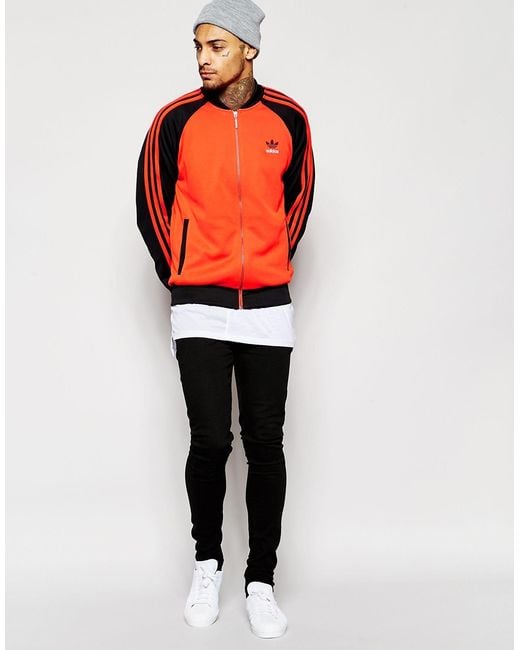 Adidas jacket top black and orange