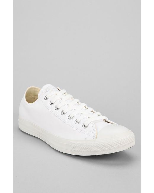 white leather low tops