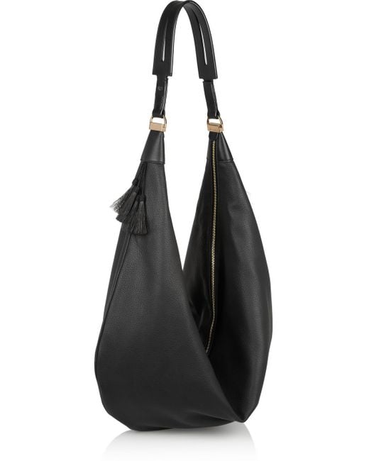 The Row Sling Hobo Bag in Black | Lyst