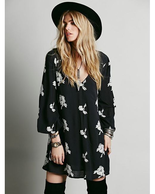 free people black embroidered dress Versace Jeans Couture Versace Jersey Long-Sleeve Black Minidress with Scoopneck and Logo Charm Strap main image 1