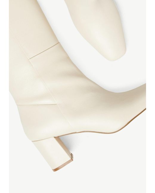 Comma, White Stiefel
