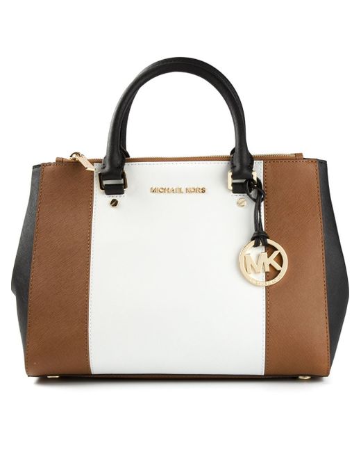 mk purse white and brown