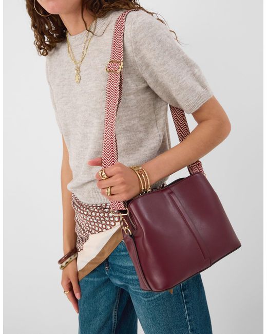 Accessorize Red Webbing Strap Crossbody Bag