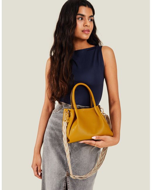 Accessorize Metallic Women's Yellow Cross-body Bag With Webbing Strap