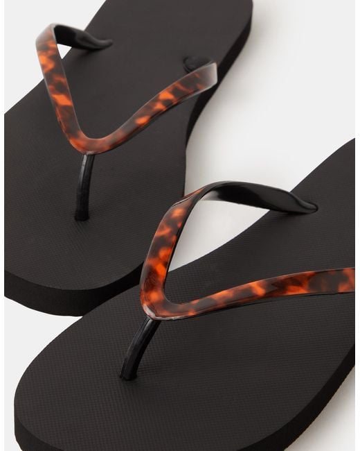 Accessorize Black Tort Flip Flops