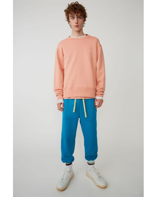 light pink crew neck sweatshirt