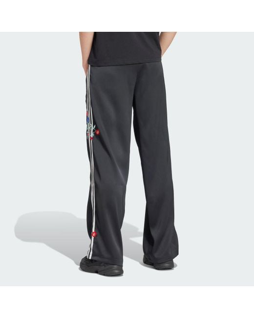 Pantalón Firebird Graphics Floral Adidas de color Black