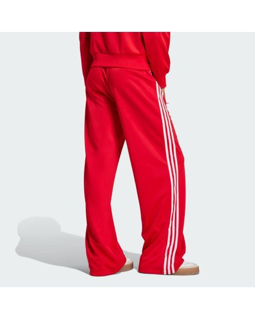 Track Pants Adicolor Classic Firebird Loose di Adidas in Red