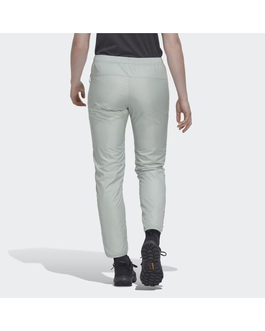 Pantaloni Multi Primegreen Windfleece di Adidas in Multicolor