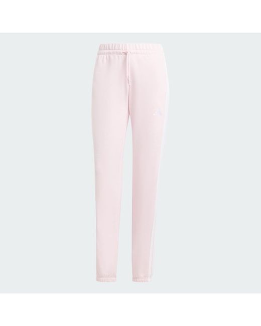 Pantalón Essentials French Terry Cuffed 3 Bandas Adidas de color White