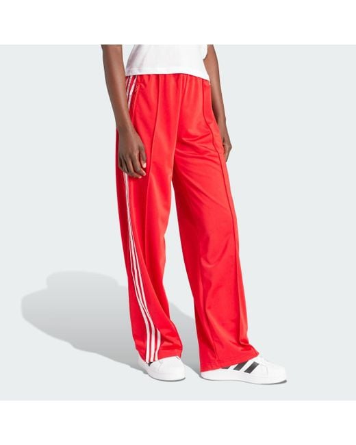 adidas Firebird Loose Trainingsbroek in het Rood Lyst NL