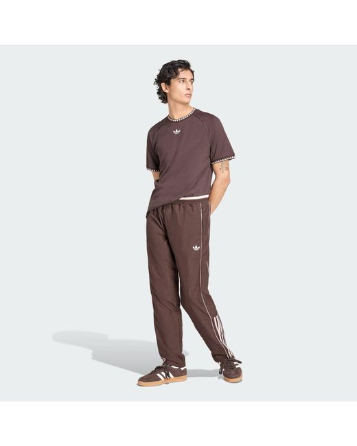 Adidas Originals Brown Half Stripes Track Pants for men
