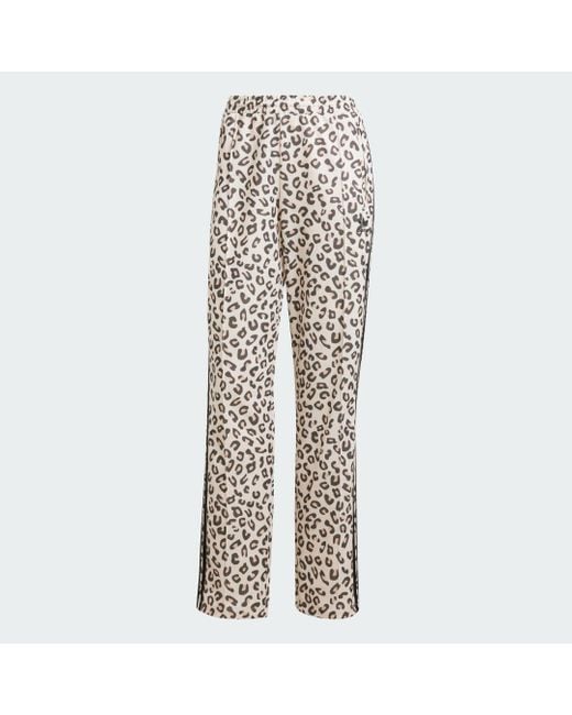 Pantalón Firebird Leopard Adidas de color Black