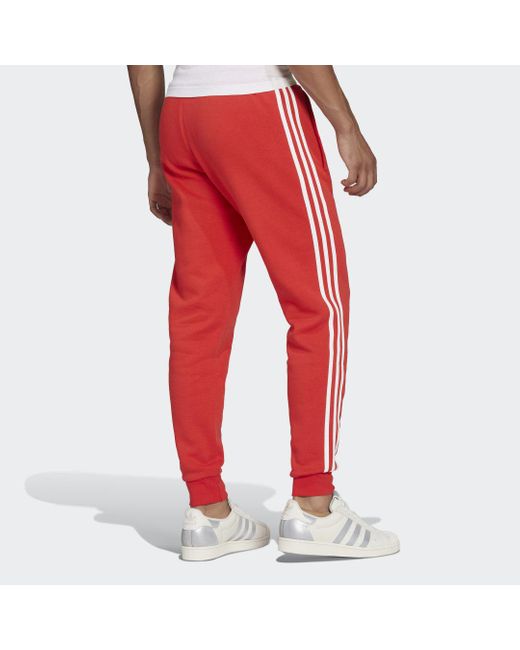 Pantalón Adicolor Classics 3 bandas adidas de Polar de color Rojo para  hombre | Lyst