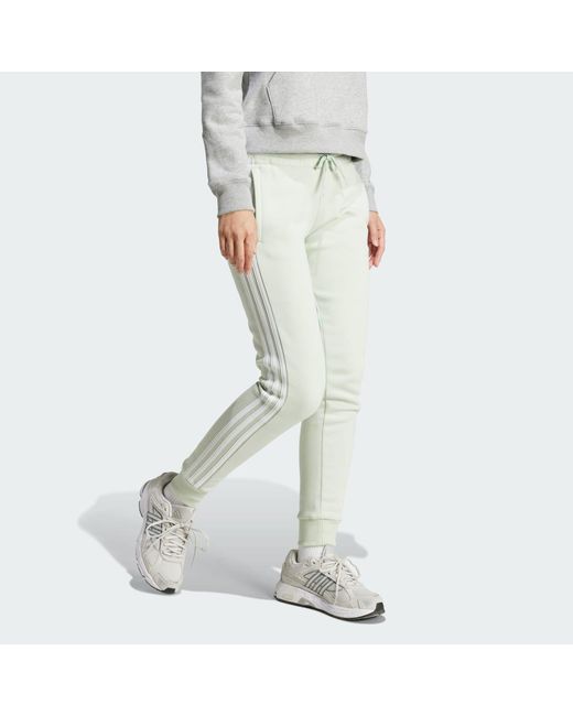 Pantaloni Essentials 3-Stripes Fleece di Adidas in White