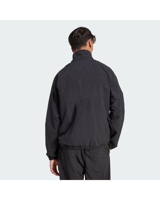 Giacca A Vento Essenziale Con Logo Piccolo di Adidas in Black da Uomo