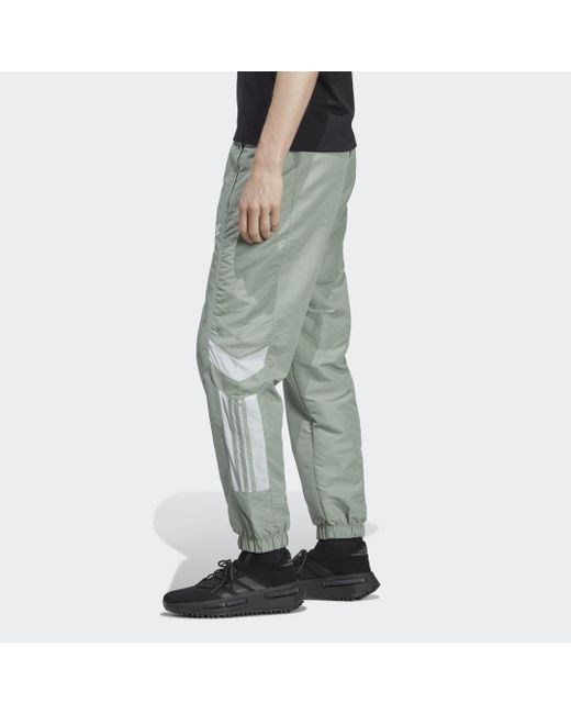 Track pants Rekive Woven di Adidas in Green da Uomo