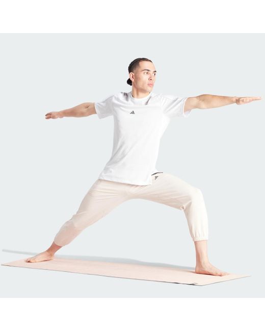Pantaloni da allenamento Designed for Training Yoga 7/8 di Adidas in Natural da Uomo