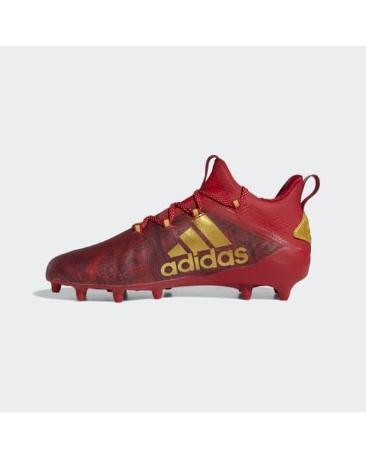 adidas red spike cleats