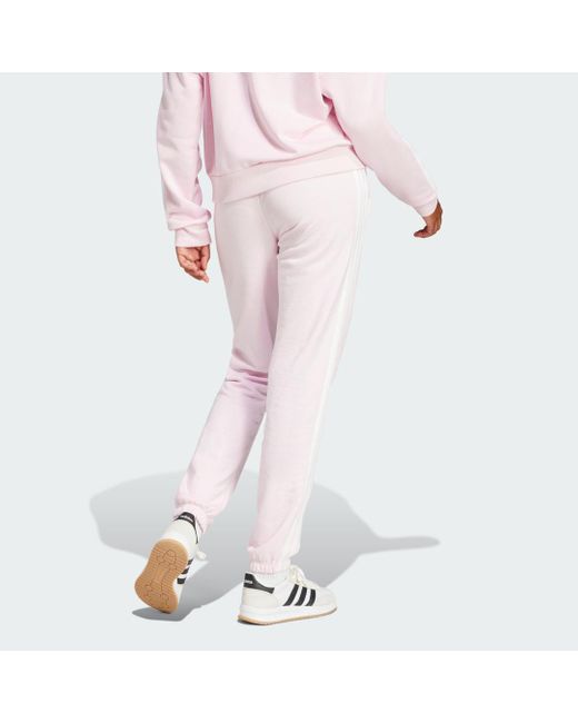 Pantalón Essentials French Terry Cuffed 3 Bandas Adidas de color White