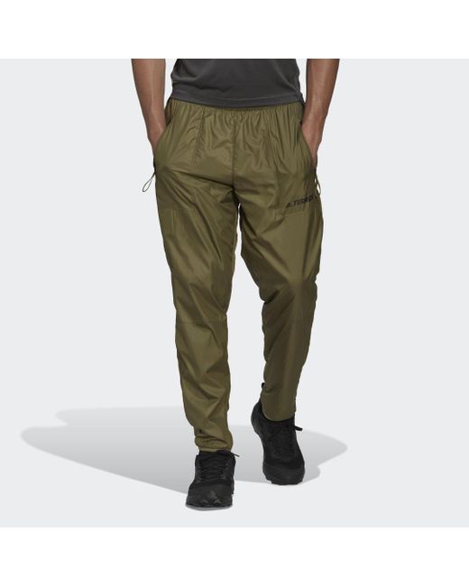 Pantaloni Multi Primegreen Windfleece di Adidas da Uomo