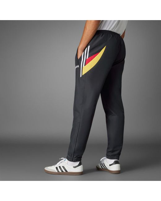 Pantaloni da allenamento 1996 Woven Germany di Adidas in Gray