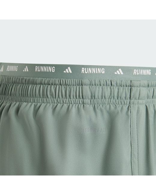 Adidas Originals Green Own The Run 3-Stripes 2-In-1 Shorts for men