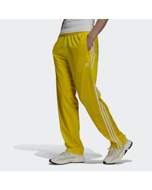 Pantalon de survêtement Adicolor Classics Firebird Primeblue adidas pour  homme en coloris Jaune | Lyst