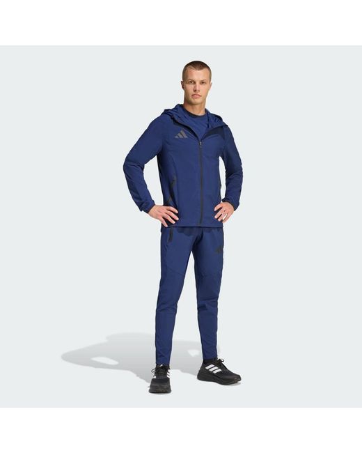 Adidas Blue Tiro Travel Woven Tracksuit Bottoms for men