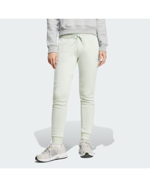Pantaloni Essentials 3-Stripes Fleece di Adidas in White
