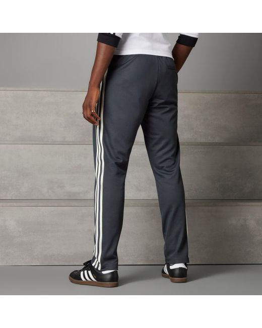 Pantaloni da allenamento Beckenbauer Germany di Adidas in Gray