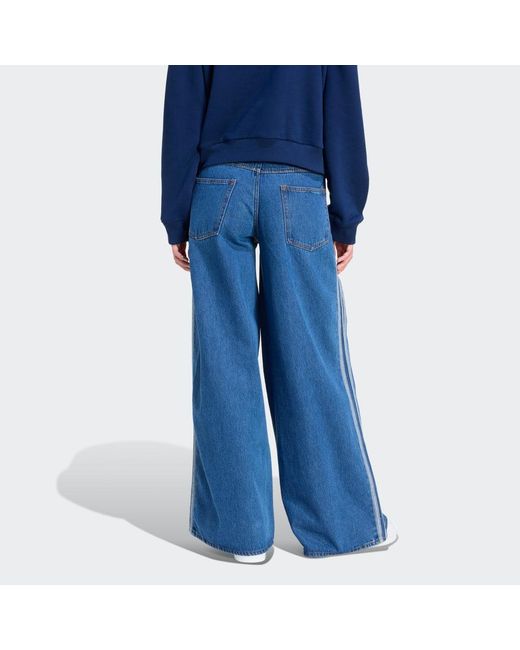 Pantaloni Track Firebird Adilenium di Adidas in Blue