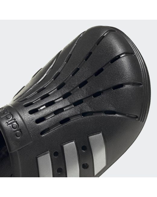 adidas Synthetisch Adilette Instappers in het Zwart - Lyst