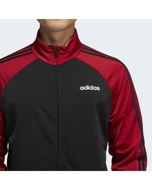 red adidas jacket with black stripes