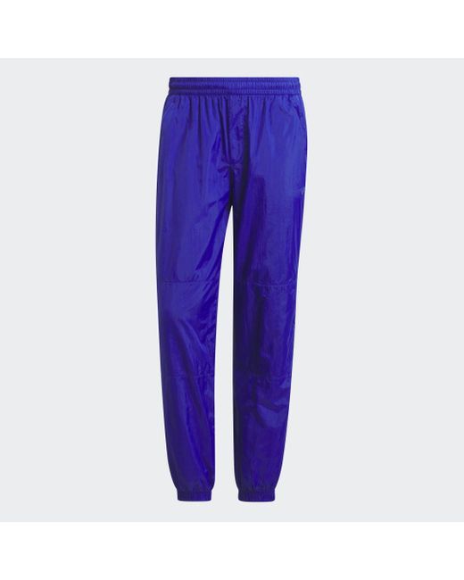 Pantaloni Premium Essentials Crinkle Nylon di Adidas in Purple da Uomo